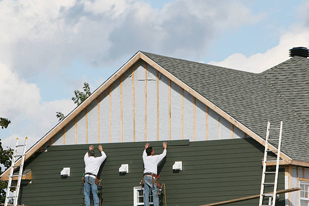 Professional Siding Installation technician working in Church Hill, MD